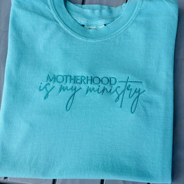 Motherhood is a Ministry Embroidered Wholesale Tee
