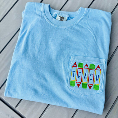 Teach Pencils Embroidered Pocket Wholesale Tee